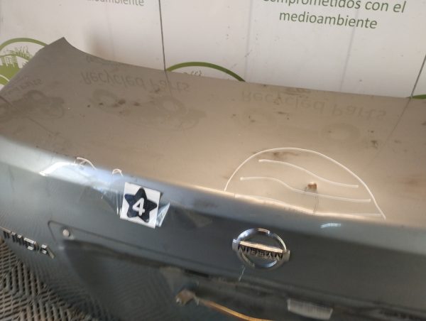 Tapa De Baul Nissan Tiida (05373569)